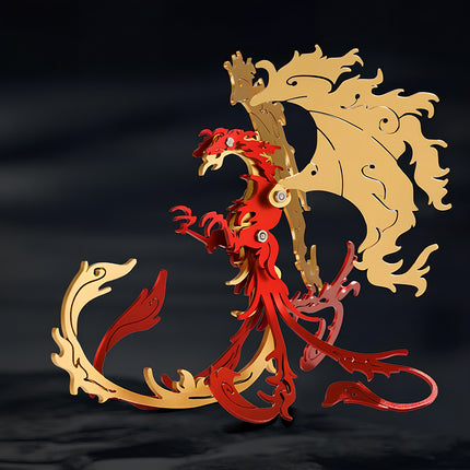 An assembled red and gold mechanical steampunk phoenix 3D puzzle metal kit showcased against a dark studio background.