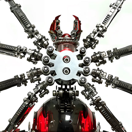 Bottom view showing the symmetrical joints and metallic underbelly structure of a red mechanical spider 3D puzzle metal kit.