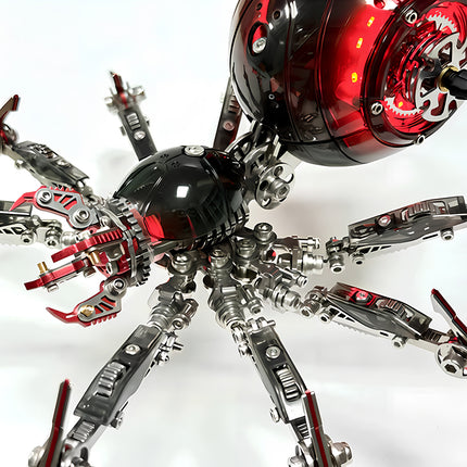 Close-up view of the head and front legs of a red mechanical spider built with 3D puzzle metal kits.