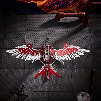 Completed red mechanical eagle from 3D puzzle Metal Kits, a high-quality metal model with intricate wing layers and industrial design.