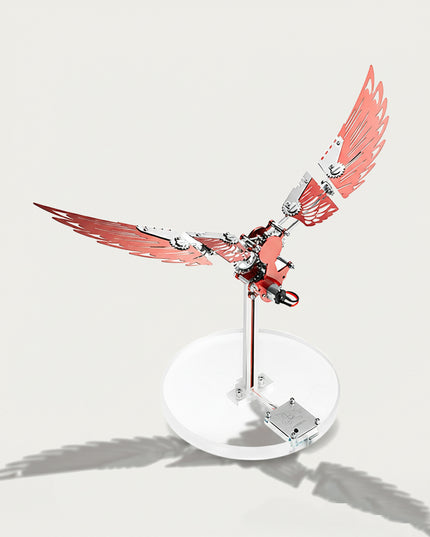 Table Funny 3D Puzzle Metal Kits Fold-Wing Machine Artwork - A striking kinetic creation for DIY enthusiasts, industrial/mechanical design lovers, and decor admirers, this piece from Table Funny is an elaborate fold-wing machine (with motion function) assembled from 3D puzzle metal kits. It features a red-and-silver metallic structure, articulated foldable wing segments (with gear details), a motorized core (for wing movement), and a clear circular stand base
