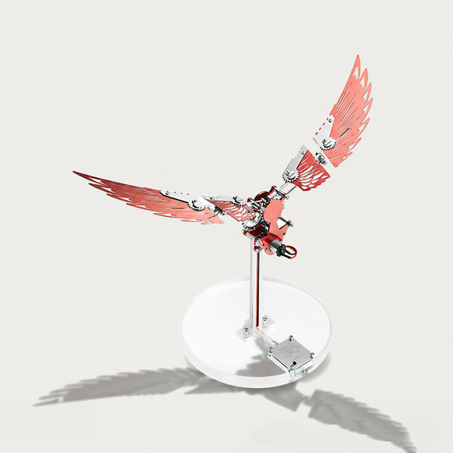Table Funny 3D Puzzle Metal Kits Fold-Wing Machine Artwork - A striking kinetic creation for DIY enthusiasts, industrial/mechanical design lovers, and decor admirers, this piece from Table Funny is an elaborate fold-wing machine (with motion function) assembled from 3D puzzle metal kits. It features a red-and-silver metallic structure, articulated foldable wing segments (with gear details), a motorized core (for wing movement), and a clear circular stand base