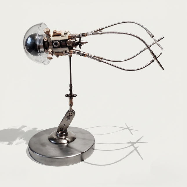 Steampunk DIY 3D metal mechanical squid jellyfish model kit with clear glass-style acrylic dome, intricate metal core, and articulated tentacles on a round base.