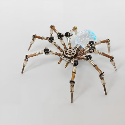 A detailed shot of the steampunk puzzle spider model against a clean background, highlighting its special rounded abdomen with colorful confetti-like details. This high-grade steam punk mech and metal model brings elite mechanical steampunk style to life through expert 3D puzzle Metal Kits craftsmanship.