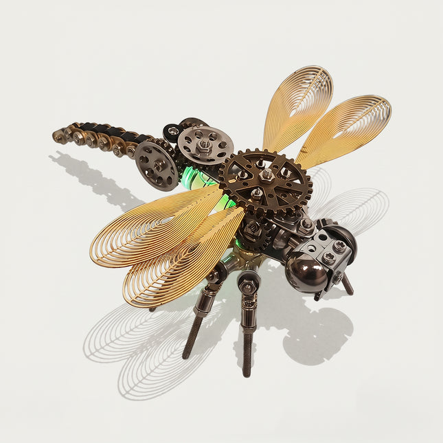 A studio-lit high-angle shot of the steampunk puzzle dragonfly model against a bright clean background, casting artistic shadows. This incredible metal model built from 3D puzzle Metal Kits emphasizes its magnificent mechanical steampunk wings and steam punk mech design details.
