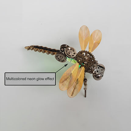 Top-angle product feature view of a steampunk puzzle dragonfly model, highlighting a "Multicolored neon glow effect" pointing to its illuminated body. This creative 3D puzzle Metal Kits item combines a segmented gear tail, filigree wire wings, and mechanical steampunk details into a fascinating metal model / steam punk mech showcase.