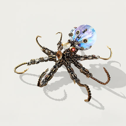 A high-angle product shot of a steampunk puzzle octopus model featuring a vibrant blue-and-purple galaxy-patterned translucent spherical head and spread chain-link tentacles. Crafted from 3D puzzle Metal Kits, this metal model highlights superior mechanical steampunk and steam punk mech craftsmanship.