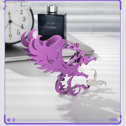 A completed TableFunny mythical cat princess metal model displayed as a stylish office desk decor next to a clock and perfume. This unique 3D puzzle Metal Kits makes a creative gift for fantasy lovers.