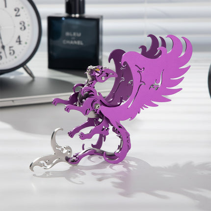 Side view of the completed TableFunny purple mythical cat princess metal model. Displayed on a bright white desk, this unique steam punk mech showcases the exquisite design of our 3D puzzle Metal Kits.