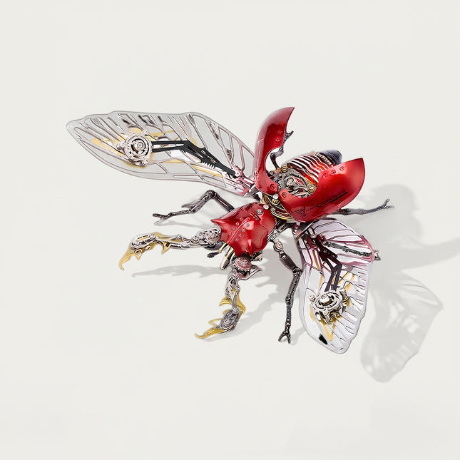 Angled view of Tablefunny's red steampunk stag beetle 3D metal puzzle model featuring open red wing covers, silver gear-detailed wings, gold-tipped mechanical mandibles and intricate metal legs