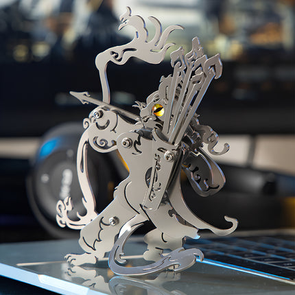 A close-up back-侧面 view of the silver mythical cat archer metal model on a desk by TableFunny. This steam punk mech showcase emphasizes the intricate arrows and quiver structure of the steampunk puzzle.