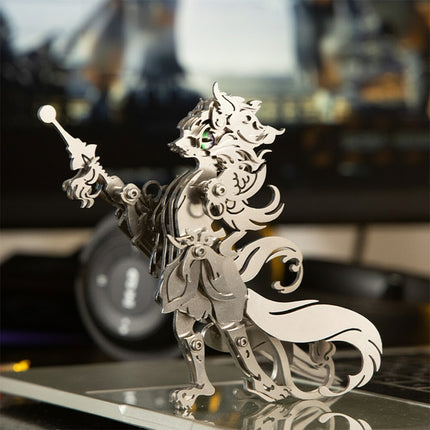 A silver mythical fox mage metal model holding a magic wand from TableFunny. Featuring a complex steam punk mech design, this mechanical steampunk fantasy figure stands elegantly on a desk.