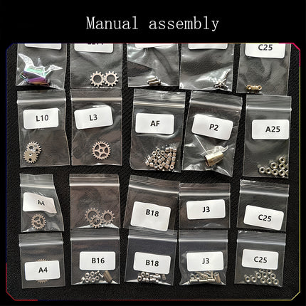 An organized layout of bagged components and labeled parts for a steam punk mech metal model kit, ready for manual assembly.
