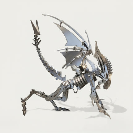 Side profile view of the steam punk mech metal model, highlighting its dynamic tail, wings, and skeletal posture on a white background.