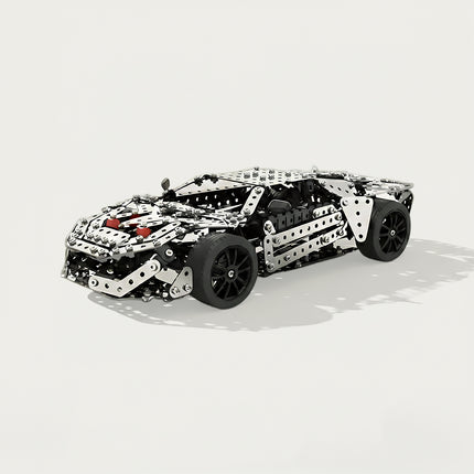 A clean white background product studio shot of a steam punk mech metal model sports car kit.