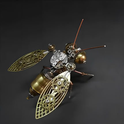 Angled top view of Tablefunny steampunk mechanical bee 3D metal model featuring ornate brass-colored wings, exposed clockwork gears, copper antennae, and a segmented metallic abdomen.