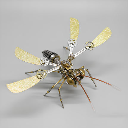 Top view of Tablefunny steampunk mechanical mosquito 3D metal puzzle with four golden wings, exposed gears, copper antennae, and metal legs.
