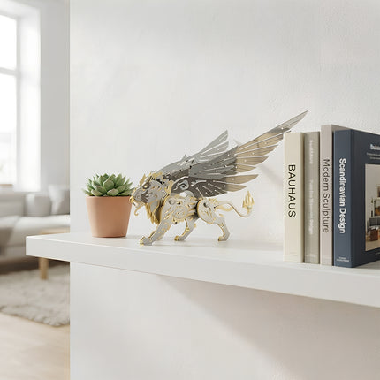 An elegant winged lion metal model displayed on a minimalist white shelf, designed as a creative steampunk puzzle and 3D puzzle Metal Kit for home decoration.