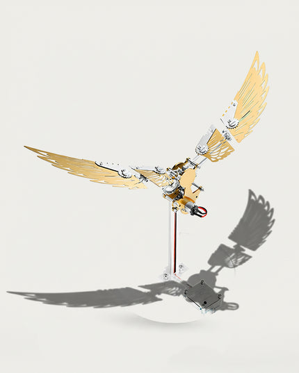 Table Funny 3D Puzzle Metal Kits Fold-Wing Machine Artwork - A stunning kinetic creation for DIY enthusiasts, industrial/mechanical design lovers, and decor admirers, this piece from Table Funny is an elaborate fold-wing machine (with motion function) assembled from 3D puzzle metal kits. It features a gold-and-silver metallic structure, articulated foldable wing segments (with gear details), a motorized core (for wing movement), and a clear stand base